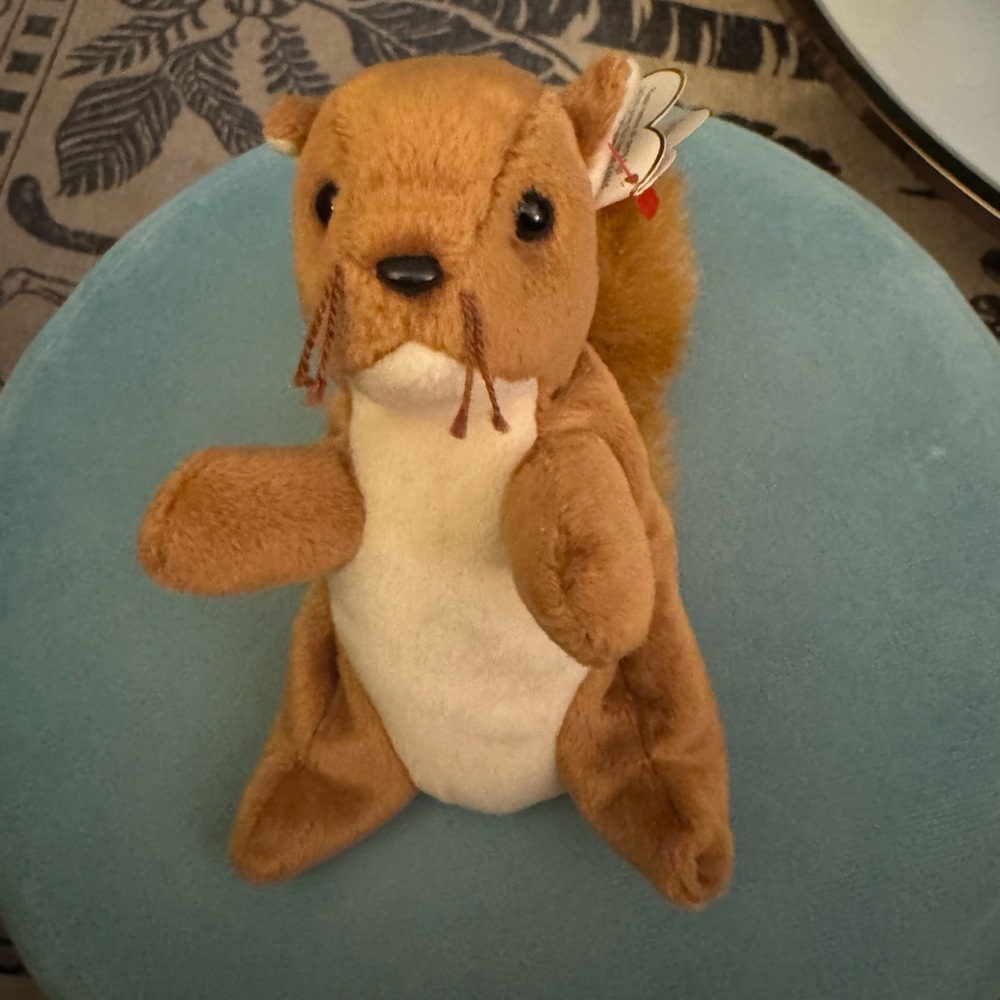 Ty Beanie Baby Nuts the squirrel. Tag is dated January 21, 1996.